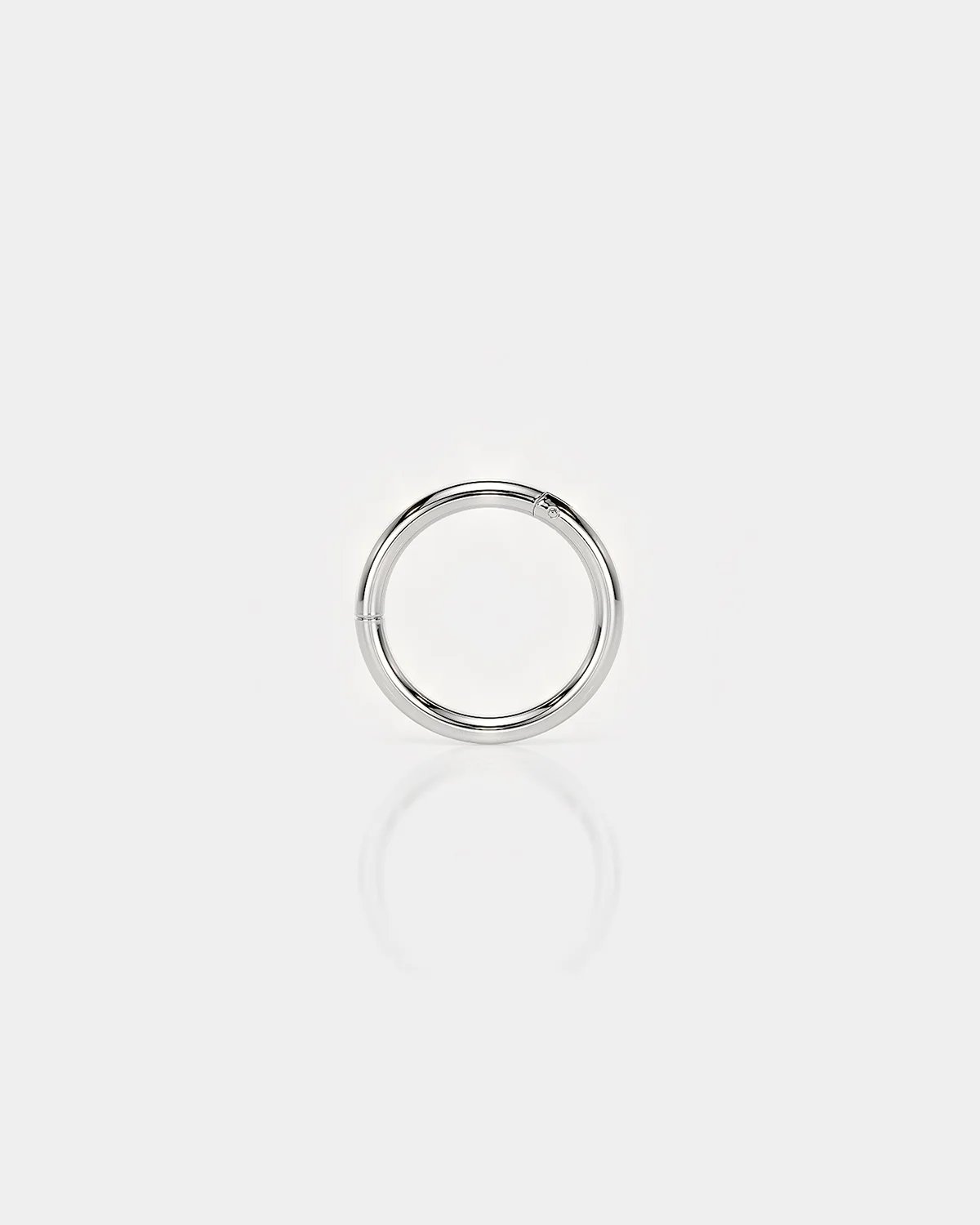 Polished silver titanium hinged piercing ring