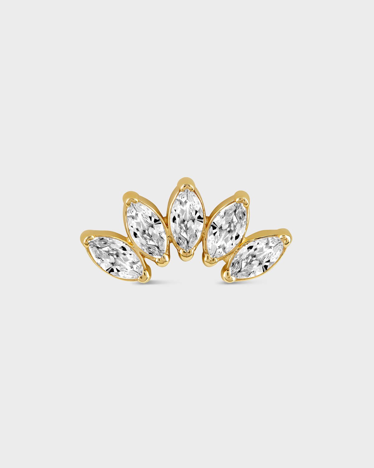 Gold earring with five marquise gems on a light gray background