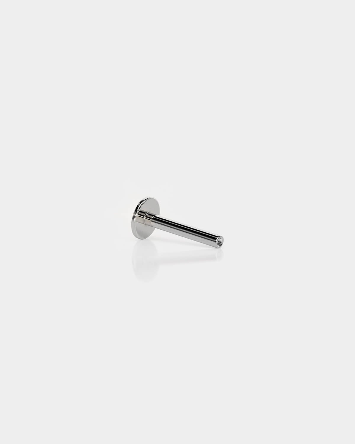 Internally threaded titanium labret back in polished silver with a 4mm base and 16g shaft on a light gray background